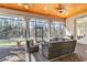 Enjoy the outdoors on this screened-in patio with comfortable wicker furniture at 8285 Leone Circle, Myrtle Beach, SC 29579