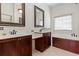 Elegant bathroom with soaking tub, double sink, and modern finishes; perfect for relaxation and rejuvenation at 853 Bluffview Dr., Myrtle Beach, SC 29579