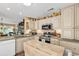 Cozy kitchen featuring ample counter space, painted cabinets, and modern appliances at 876 Antiqua Dr., Myrtle Beach, SC 29572