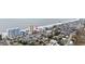 Aerial view showcases the community with the home in proximity to the beach and surrounding residential area, prime location at 900 N Waccamaw Dr. # 303, Murrells Inlet, SC 29576