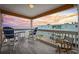 Relaxing balcony with comfortable seating, offering stunning ocean views and a perfect spot for enjoying sunsets at 900 N Waccamaw Dr. # 303, Murrells Inlet, SC 29576