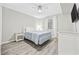 Bedroom with a queen bed, ceiling fan, and white furniture at 900 N Waccamaw Dr. # 303, Murrells Inlet, SC 29576