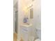 Bright bathroom featuring a single vanity, mirror, shower and toilet at 9501 Shore Dr. # A-314, Myrtle Beach, SC 29572