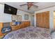 A bedroom with a dresser and TV at 9501 Shore Dr. # A-314, Myrtle Beach, SC 29572