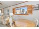 A dining room with a wooden table and chairs at 9501 Shore Dr. # A-314, Myrtle Beach, SC 29572