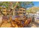 Community grilling area with a table and chairs, perfect for outdoor dining and socializing at 9501 Shore Dr. # A-314, Myrtle Beach, SC 29572