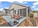 Spacious backyard with a concrete patio, a fence, and a view of the pond at 982 Bonita Loop, Myrtle Beach, SC 29588