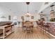 Inviting dining area featuring a round table and bar seating, with a glimpse into the living area at 982 Bonita Loop, Myrtle Beach, SC 29588