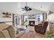 Spacious living room with a vaulted ceiling, fireplace, and sliding glass doors at 982 Bonita Loop, Myrtle Beach, SC 29588