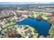 Aerial view of a waterfront neighborhood featuring homes and lush landscaping at 1042 Muscovy Pl., Conway, SC 29526