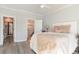 A cozy bedroom with a comfortable bed, soft lighting and neutral colored walls at 1042 Muscovy Pl., Conway, SC 29526