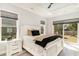 Bright and airy main bedroom with a ceiling fan, a king bed, and a sliding glass door leading to the outdoors at 1042 Muscovy Pl., Conway, SC 29526