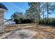 Fenced backyard with mature trees at 105 Wagon Wheel Ln., Surfside Beach, SC 29575