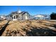 Spacious backyard view featuring a white fence and the home's exterior at 105 Wagon Wheel Ln., Surfside Beach, SC 29575