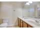 Bathroom with a double sink vanity, and standard toilet at 105 Wagon Wheel Ln., Surfside Beach, SC 29575