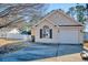 Charming single-Gathering home with a garage and well-manicured front lawn, perfect for suburban living at 105 Wagon Wheel Ln., Surfside Beach, SC 29575