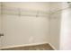 Walk-in closet with carpet, and wire shelving at 105 Wagon Wheel Ln., Surfside Beach, SC 29575