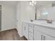 The spacious bathroom offers a double vanity with modern fixtures and ample storage space at 1064 Jase Dr., Longs, SC 29568