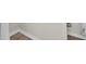 Close-up showcasing bathroom trim and flooring detail at 1064 Jase Dr., Longs, SC 29568
