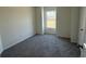 Bedroom featuring neutral colored walls and carpet, and one window for ample natural light at 1064 Jase Dr., Longs, SC 29568