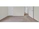 This is an empty bedroom with beige walls and carpet, showing its potential as a blank canvas at 1064 Jase Dr., Longs, SC 29568
