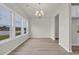 Open dining room with hardwood floors and views of the water at 1064 Jase Dr., Longs, SC 29568