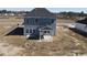 Rear view of a charming two-story home with a covered porch at 1064 Jase Dr., Longs, SC 29568