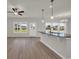 Bright kitchen with island, pendant lights, and views to the backyard at 1064 Jase Dr., Longs, SC 29568