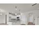Modern kitchen featuring an island with granite countertop and pendant lights at 1064 Jase Dr., Longs, SC 29568