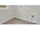Neutral laundry room featuring laminate wood floors at 1064 Jase Dr., Longs, SC 29568