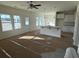 View of an open living and kitchen area with lots of windows and natural light at 1064 Jase Dr., Longs, SC 29568