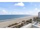 This stunning shot shows the wide beach from a high angle, with the ocean visible in the distance at 1105 S Ocean Blvd. # 604, Myrtle Beach, SC 29577