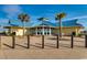 Exterior view of the community clubhouse with lush landscaping at 123 Avian Dr. # 102, Pawleys Island, SC 29585