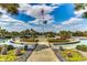 Community water feature surrounded by colorful flowers and green landscaping at 123 Avian Dr. # 102, Pawleys Island, SC 29585