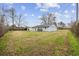 Exterior view of the home and shed in the large backyard at 125 Ole Cedar Ln., Conway, SC 29526