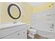 A bathroom featuring a decorative mirror, single sink vanity and a shower/tub combo at 125 Ole Cedar Ln., Conway, SC 29526