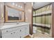 Bathroom with a single sink vanity and a shower/tub combo at 125 Ole Cedar Ln., Conway, SC 29526