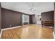 A bedroom with a ceiling fan, en suite bathroom access and wood-look flooring at 125 Ole Cedar Ln., Conway, SC 29526