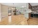 An eat-in kitchen featuring stainless appliances, a breakfast bar and access to the rear deck at 125 Ole Cedar Ln., Conway, SC 29526