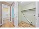 Laundry room with shelving and views into the nearby bathroom at 125 Ole Cedar Ln., Conway, SC 29526