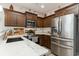 Stylish kitchen featuring stainless steel appliances, granite countertops, and ample cabinet space at 129 Tomoka Trail, Longs, SC 29568