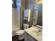 Standard bathroom with a tub and shower, storage cabinet, toilet and sink at 1298 River Oaks Dr. # 5-F, Myrtle Beach, SC 29579