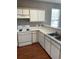 Well-organized kitchen offering laminate countertops and cabinetry, and modern appliances at 1298 River Oaks Dr. # 5-F, Myrtle Beach, SC 29579