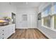 Well-lit bedroom features a window with blinds and spacious closet at 140 Northside Dr., Little River, SC 29566