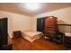 Bedroom featuring neutral walls, a bed, dresser, and hardwood floors at 1456 Baldwin Ct. # 1456, Little River, SC 29566