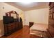 Bedroom featuring neutral walls, a bed, dresser, and hardwood floors at 1456 Baldwin Ct. # 1456, Little River, SC 29566