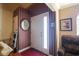 Inviting foyer with patterned wallpaper, a white front door, and a warm, welcoming ambiance at 1456 Baldwin Ct. # 1456, Little River, SC 29566