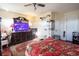 Comfortable main bedroom featuring a ceiling fan, television, and a spacious dresser at 1456 Baldwin Ct. # 1456, Little River, SC 29566