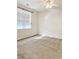 Bright bedroom with a ceiling fan, a window with blinds, and neutral carpet flooring at 162 Mountain Ash Ln., Myrtle Beach, SC 29579