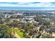 Scenic aerial view of the property surrounded by greenery near the coast and golf course at 172 Hawthorn Dr., Pawleys Island, SC 29585